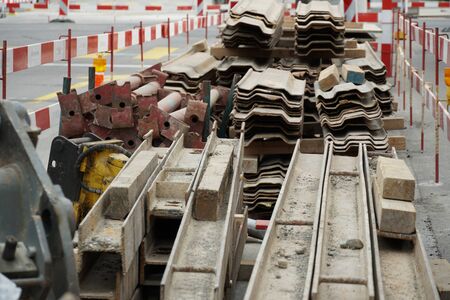 Stack of material for civil engineering construction prepared direct on the construction site behind...