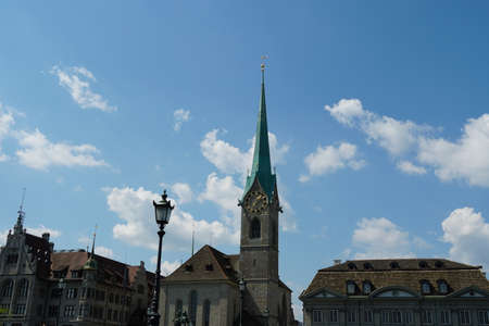 Skyline of Zurich with the tower of Frauenmünster Church and a lantern and the surrounding historic buildingsのeditorial素材