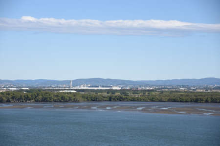 Approach to Port of Brisbane which is located in the lower reaches of the Brisbane River during ebb...