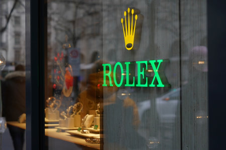Zurich, Switzerland - 12 12 2020: Rolex a famous Suisse watch brand outdoor shield or sign on shopping window of boutique at Bahnhofstrasse in Zurich at Christmas time and shopping for presents.のeditorial素材