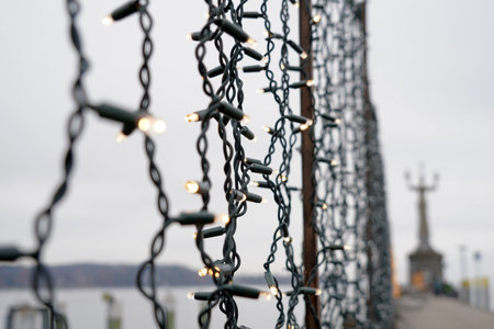 Harbor pier on the lake is empty even if there is Christmas decoration and the lights should bring a festive atmosphere. Coronavirus lockdown in Germany.の写真素材