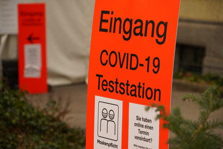 Zurich, Switzerland, 02 06 2020: Entrance to covid-19 test point or test center on the grounds of University Hospital Zurich. Instructions concerning appointment are written in German language.のeditorial素材