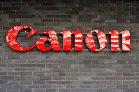Wallisellen, Switzerland - 02 23 2021: Canon headquarters in Switzerland with a logo on the wall....