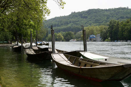 Schaffhausen, Switzerland 06 27 2021: Wooden boats called weidling in German language. Boats are...