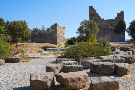 Myndos gate are the ruins of the former fortifications of Bodrum city, previously called Halicarnassus. Capture made in front view with cloudless sky on the background.の写真素材