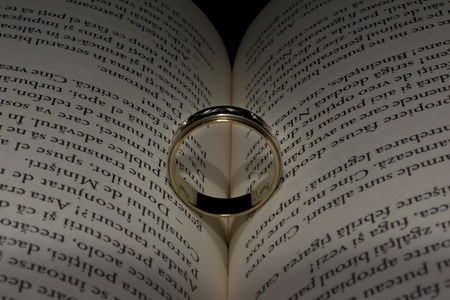 Wedding ring and bookの写真素材