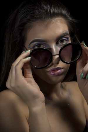 Young girl with sunglassesの写真素材