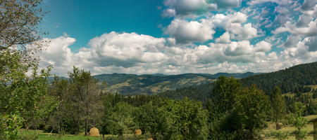 Panoramic view over Carpathian Mountains , Romania in a  beautiful summer dayの写真素材