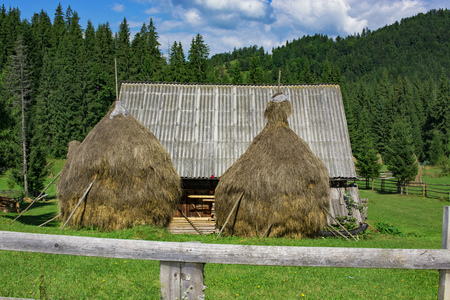 Old shepherd cottage in Carpathian Mountains Romania