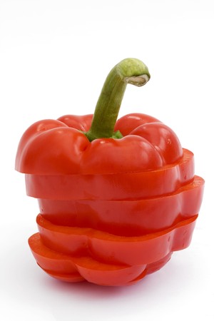 sliced red pepper isolated on a white backgroundの写真素材
