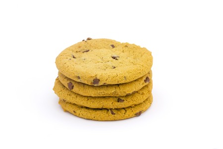 stack of chocolate chip cookies on a white backgroundの写真素材