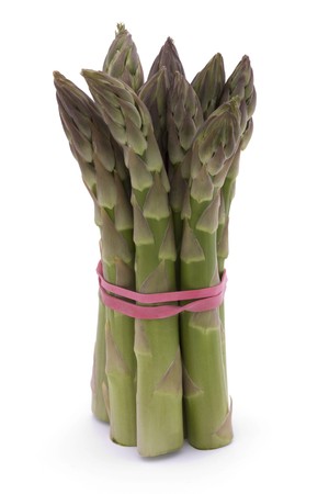 bunch of asparagus spears on a white backgroundの写真素材