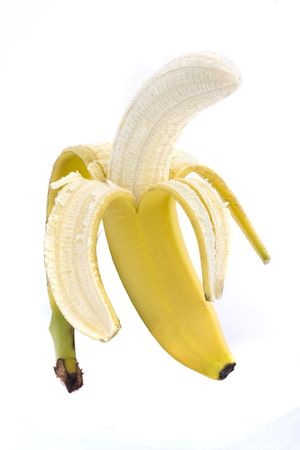 half peeled banana on a white backgroundの写真素材