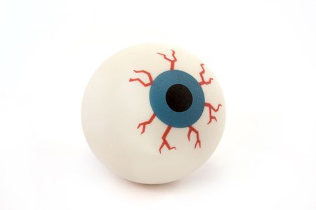 single rubber toy eyeball isolated on a white backgroundの写真素材