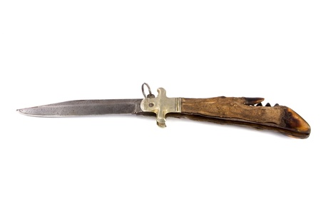 Old hoof hunting knife over white