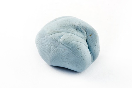 Blue tack on a white backgroundの写真素材