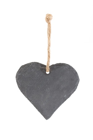 Heart shaped piece of slate over whiteの写真素材