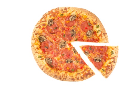 Whole pizza top view with a slice cut on whiteの写真素材
