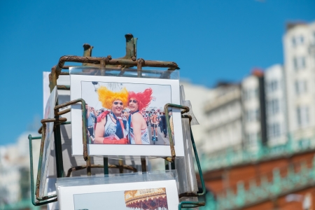 BRIGHTON, UK - JULY 28: Postcards of Brighton Gay Pride Parade for sale on the seafront in the popular seaside town in July 2013のeditorial素材