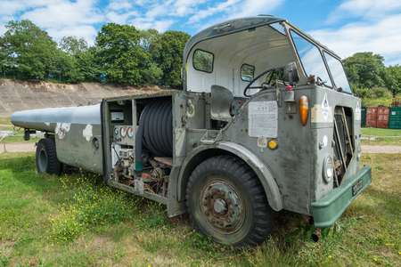 WEYBRIDGE, SURREY, UK - AUGUST 9, 2015: Vintage Airport Tug vehical on display at Brooklands Motor Museum in August 2015.のeditorial素材