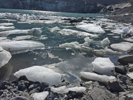 Glassy glacier lake on the Klausenpass