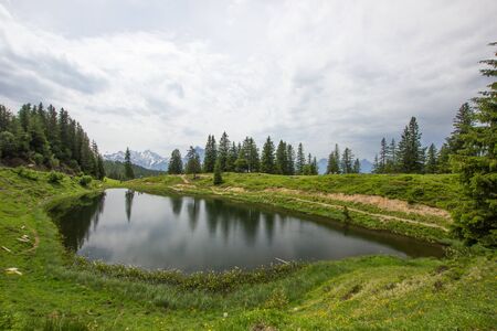 Lake Flesch on a cloudy day in the swiss mountainsの写真素材