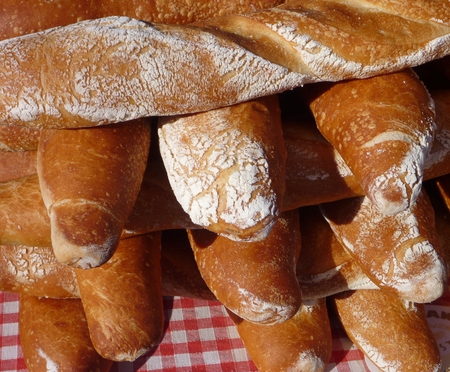 Freshly baked and crunchy baguettes at the market