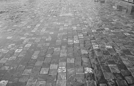 a wet pavement in a rainy weatherの写真素材