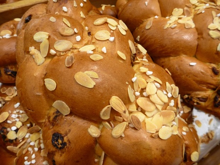 freshly baked sweet pastry with almonds on top