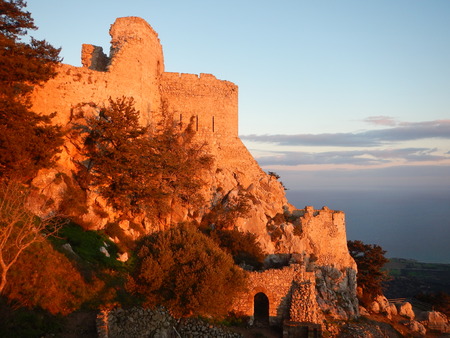 medieval kantara castle in cyprus in a romanric sunriseの写真素材