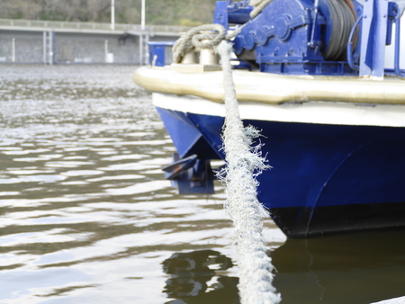 a detail of a shybby rope for a boat