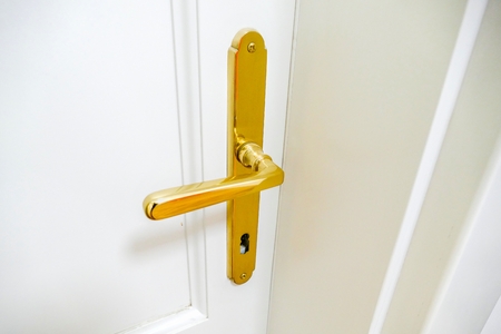 detail of a holden door handle in white doorの写真素材