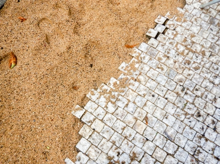 running reconstruction of a street with instalation of pipesの写真素材