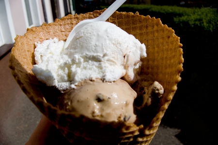 cone with three balls of sweet tasty ice creamの写真素材