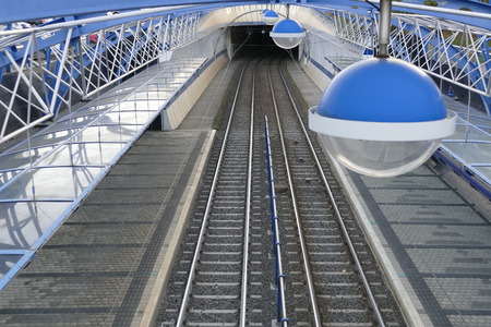 modern tram railway with a round lamp detail