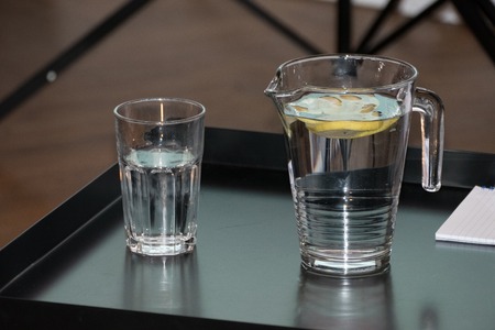 cool refreshing water with lemon on a table