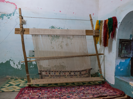 production of typical handmade arabic carpet full of colorsの写真素材