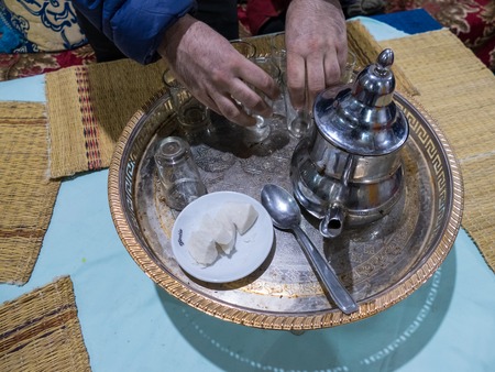 a serving of a typical moroccan tea with mint