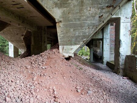 abandoned concrete ruin of an old tin mine in ore mountains in czech republic