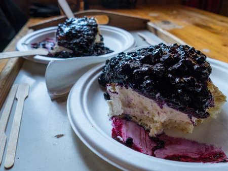 portions of pancakes with blueberries and cream cheese