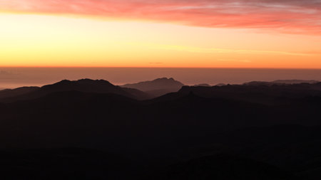 beautiful sunrise in Sardinia mountains ascending punta la marmora highest peakの写真素材