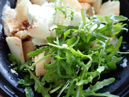 portion of vegetable salad mix with cheeseの写真素材