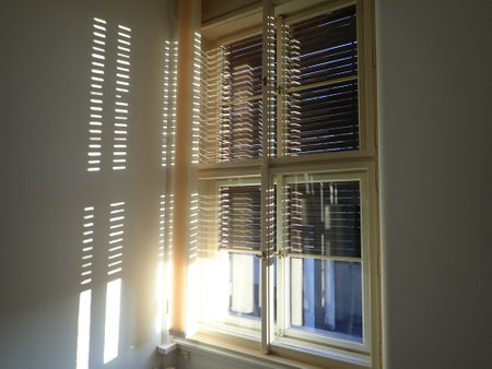 bright sun shining into a building window
