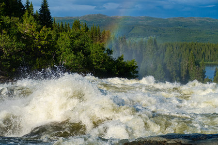 amazing beautiful powerful waterfall tannforsen in swedenの写真素材