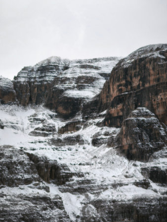 Mountain landscape in the winter. Snow and ice on the rocks.の写真素材