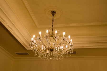 precious old historical crystal ceiling light in a palaceの写真素材