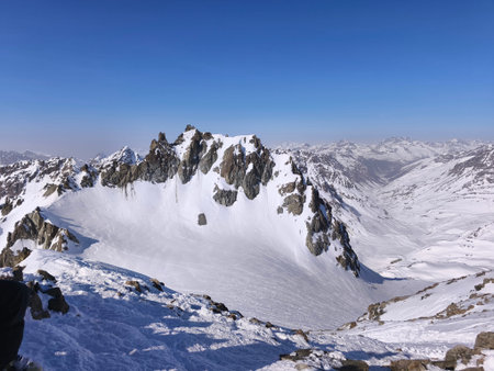 sunny winter day in the Alps with snow on mountains