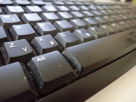 close detail of a black keyboard with letters