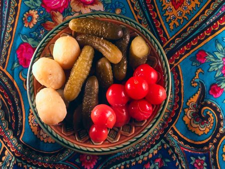 Ceramic plate with pickles on russian shawlの素材 [FY3102020547]