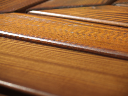 Wooden bench shooted from the narrow angleの写真素材